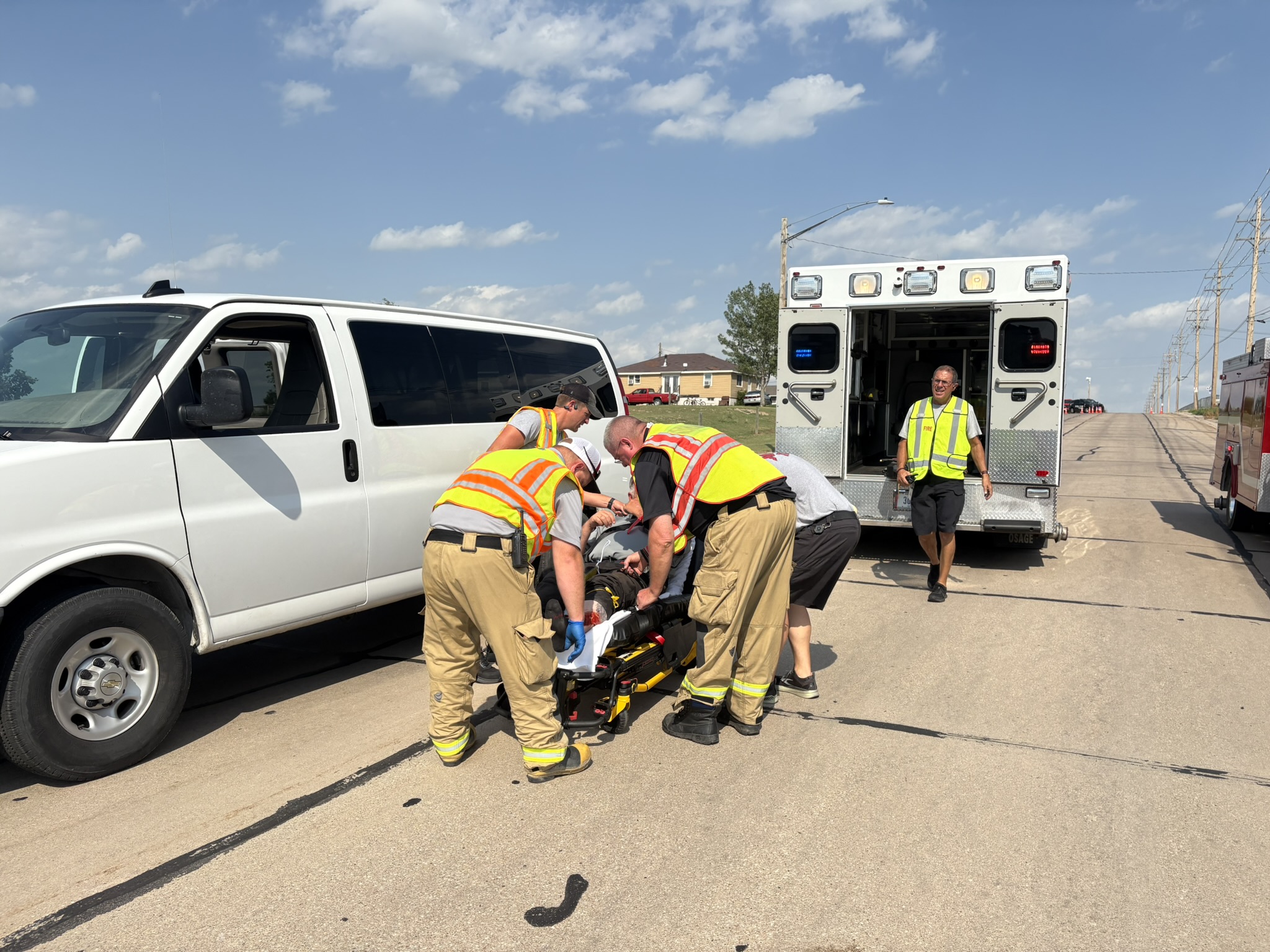 Paramedics work on simulated patient