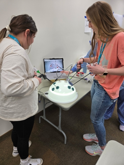 Students use laproscopic trainer