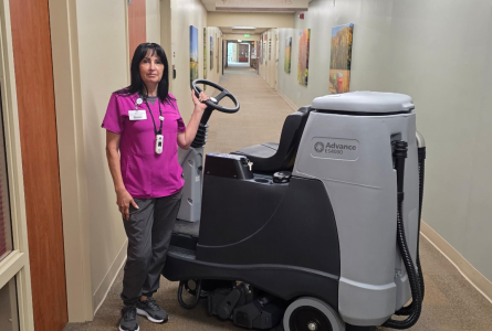 Employee with Carpet Extractor